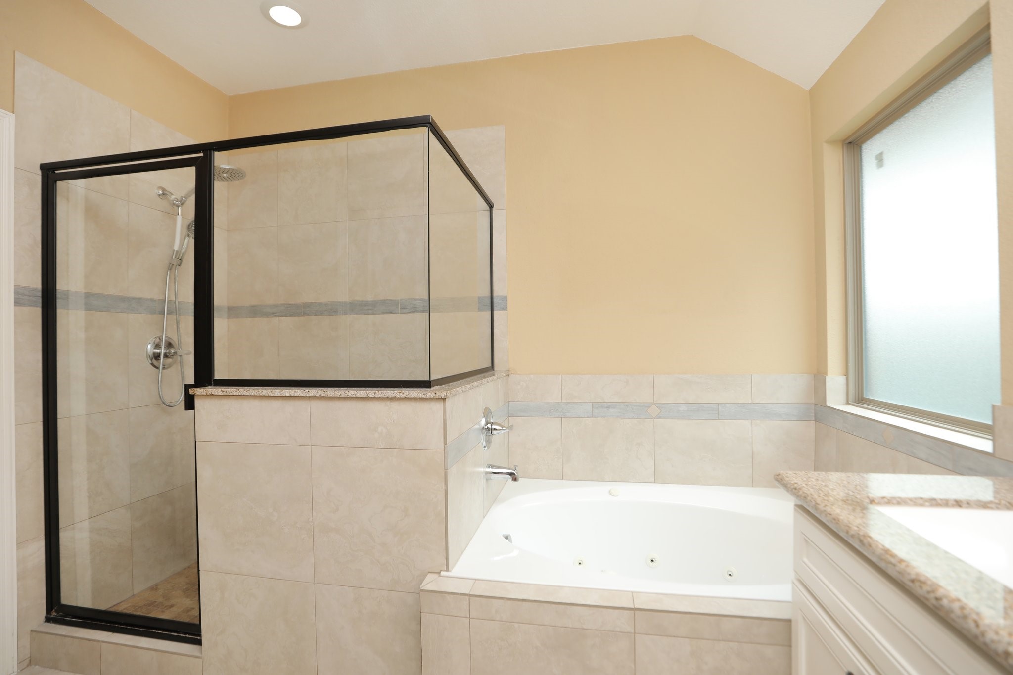 6615 Goldspier Street Houston, TX 77091 - Photo 22 of 37 Nice big walk-in shower in primary suite.