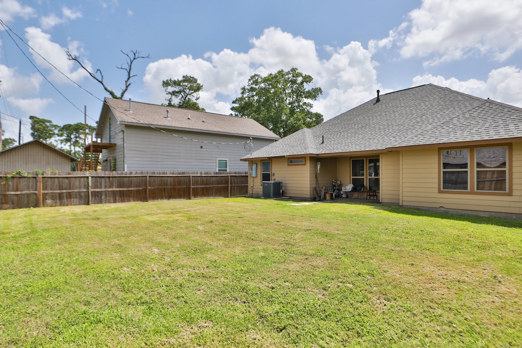 6615 Goldspier Street Houston, TX 77091 - Photo 31 of 37 Love this backyard! Plenty of room for fun, play and entertainment.