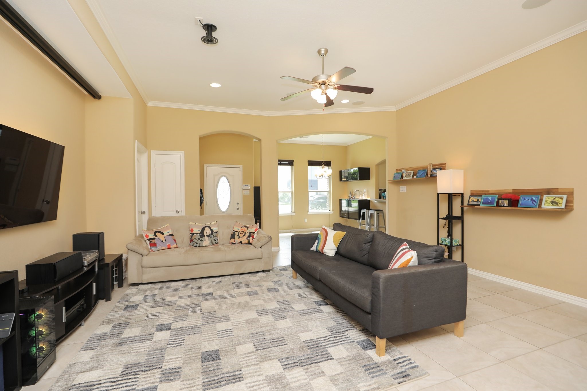 6615 Goldspier Street Houston, TX 77091 - Photo 7 of 37 High ceilings, recessed lighting. Arched doorways, crown molding. Home as Energy Efficient double pane windows throughout.