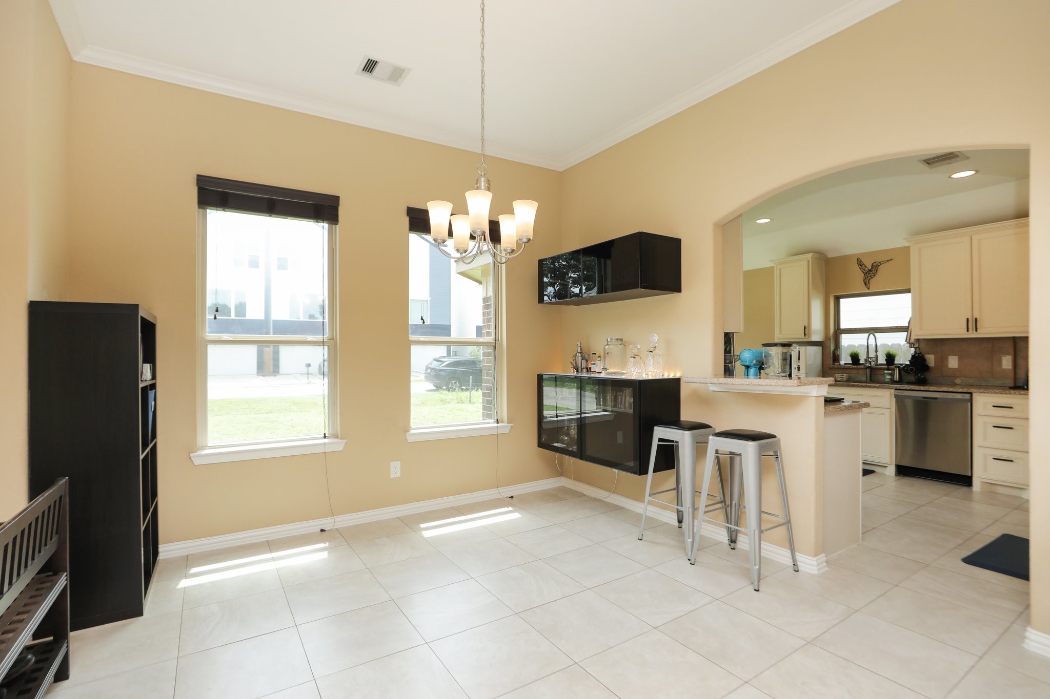 6615 Goldspier Street Houston, TX 77091 - Photo 9 of 37 Dining or study area in front of home with nice big windows opens to kitchen.