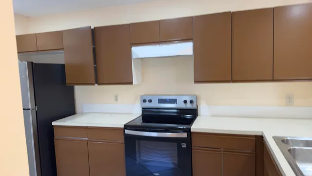a view of storage and utility room with washer and dryer