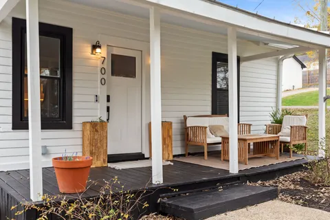 a front view of a house with porch