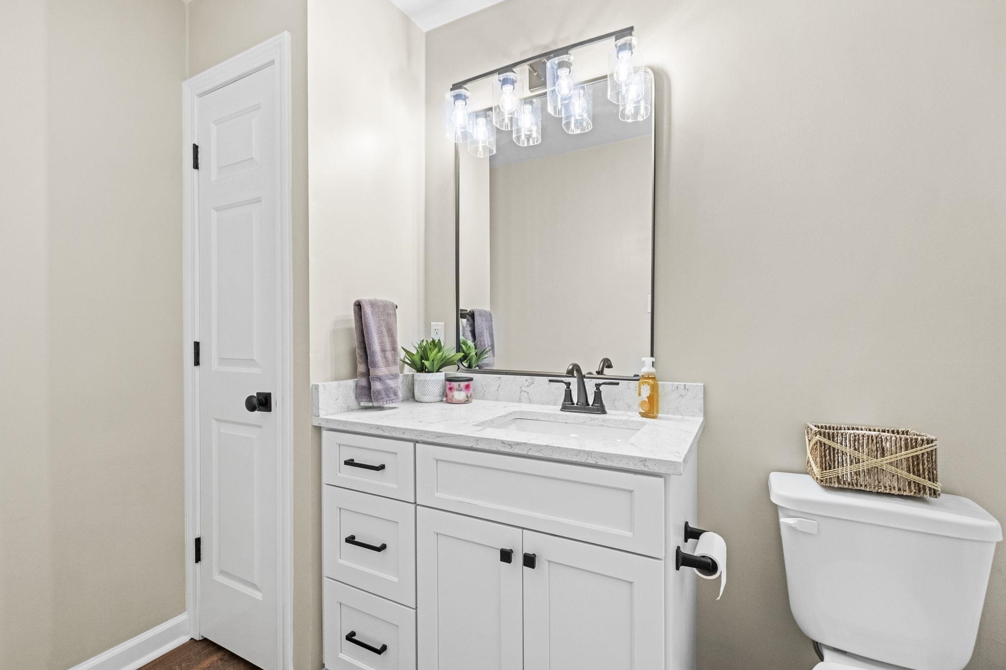 650 Firetower Road Somerville, TN 38068 - Photo 15 of 39 Half bath with vanity and toilet