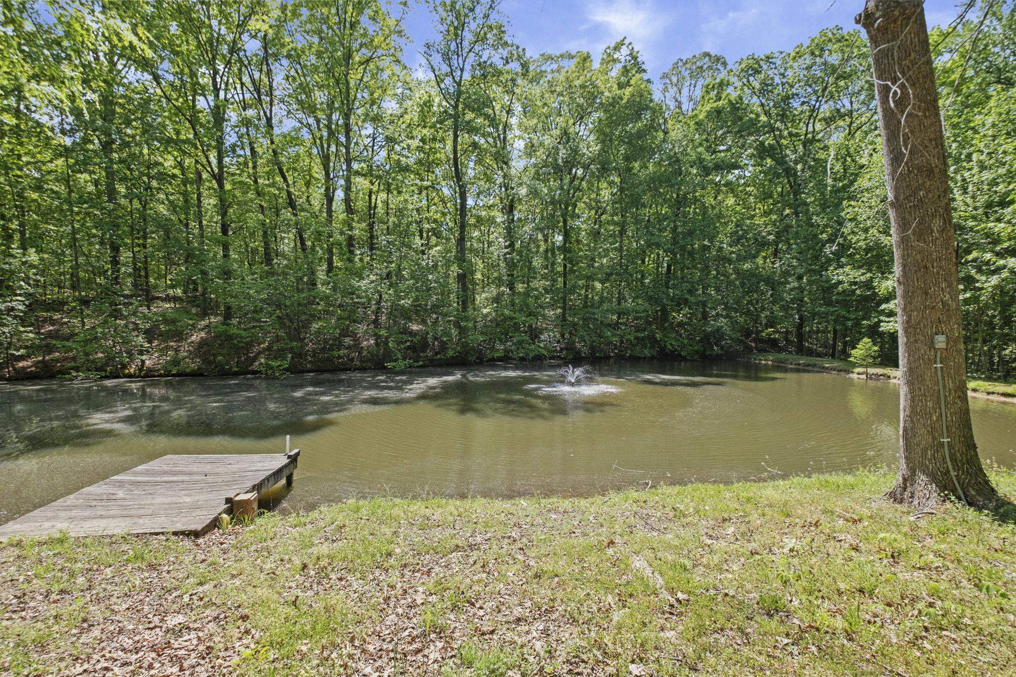 650 Firetower Road Somerville, TN 38068 - Photo 30 of 39 Water view with a dock