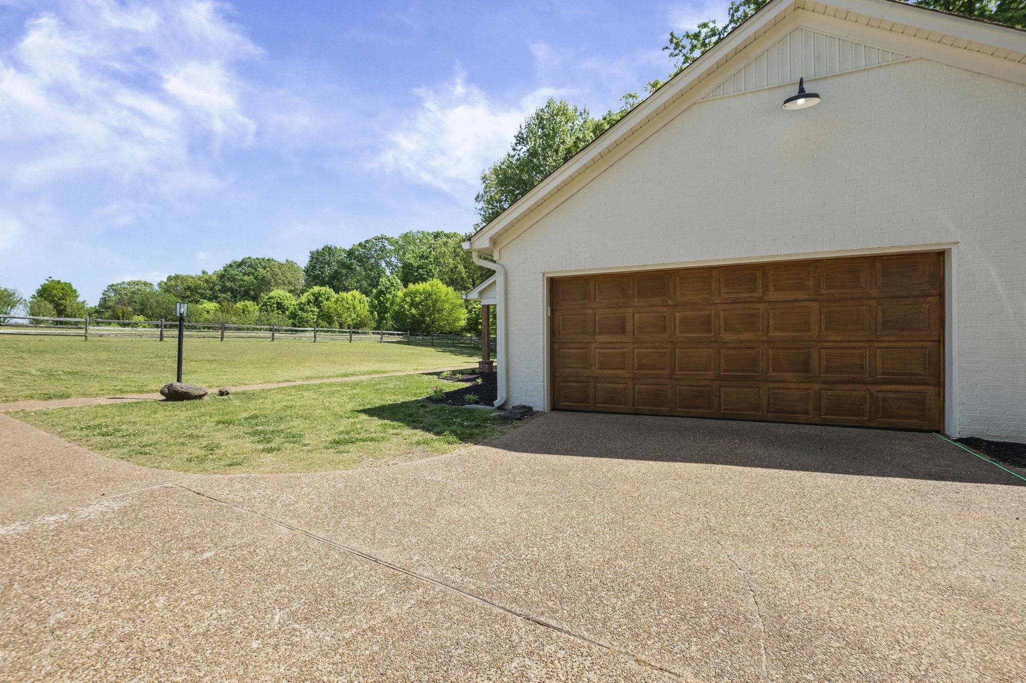 650 Firetower Road Somerville, TN 38068 - Photo 31 of 39 Garage featuring concrete driveway