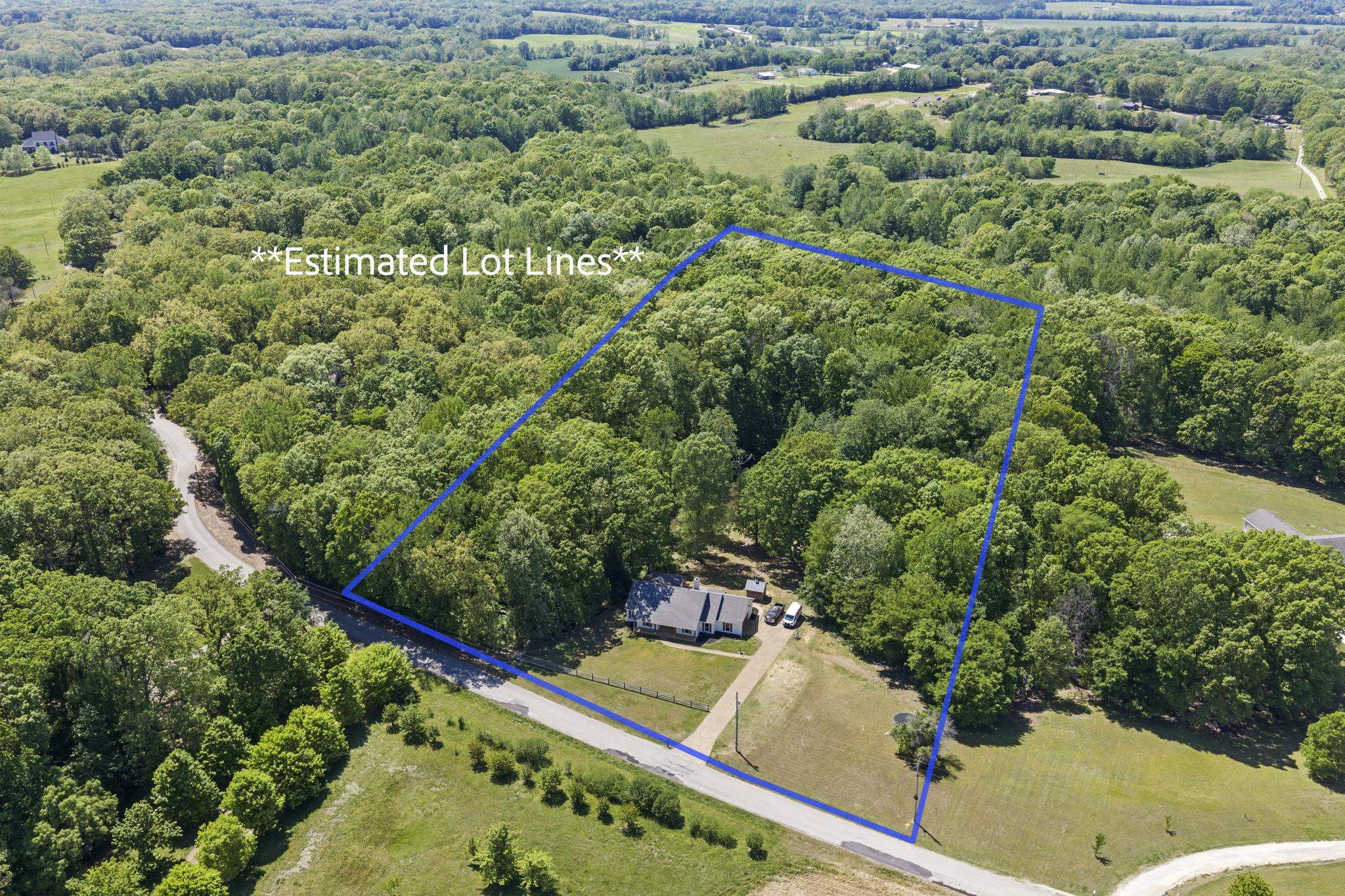 650 Firetower Road Somerville, TN 38068 - Photo 34 of 39 Aerial view of property's location with a forest and property boundaries highlighted