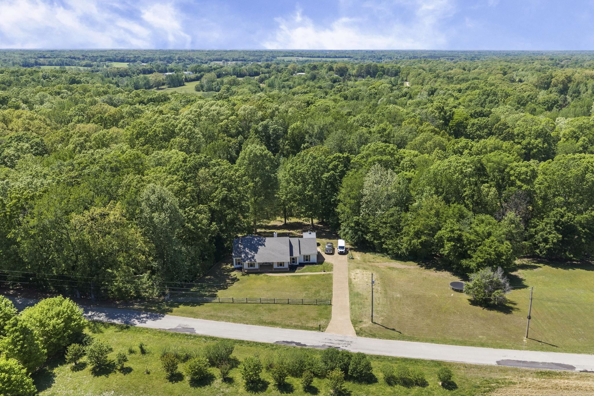 650 Firetower Road Somerville, TN 38068 - Photo 36 of 39 View of subject property featuring a heavily wooded area