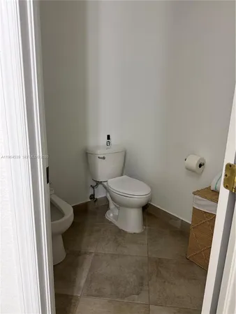 a bathroom with a toilet