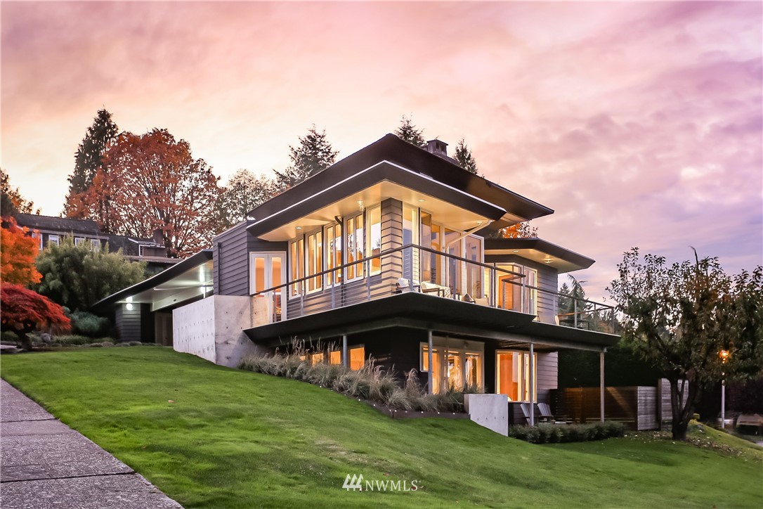 8631 Inverness Drive Northeast Seattle, WA 98115 - Photo 1 of 25 a front view of a house with a garden