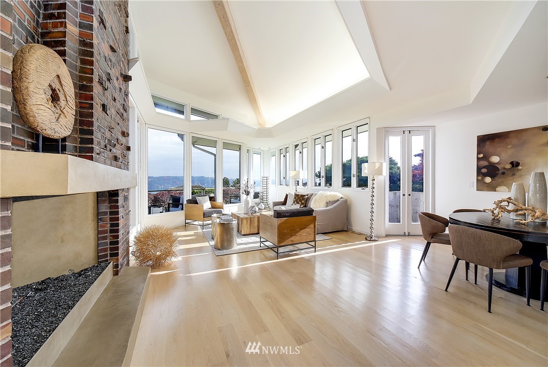 8631 Inverness Drive Northeast Seattle, WA 98115 - Photo 6 of 25 a living room with fireplace furniture and a wooden floor