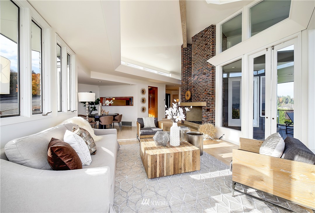8631 Inverness Drive Northeast Seattle, WA 98115 - Photo 7 of 25 a living room with furniture and a large window