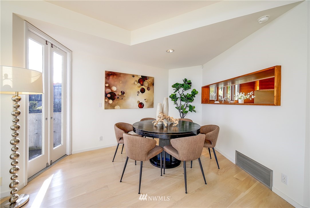 8631 Inverness Drive Northeast Seattle, WA 98115 - Photo 8 of 25 a dining room with furniture and window
