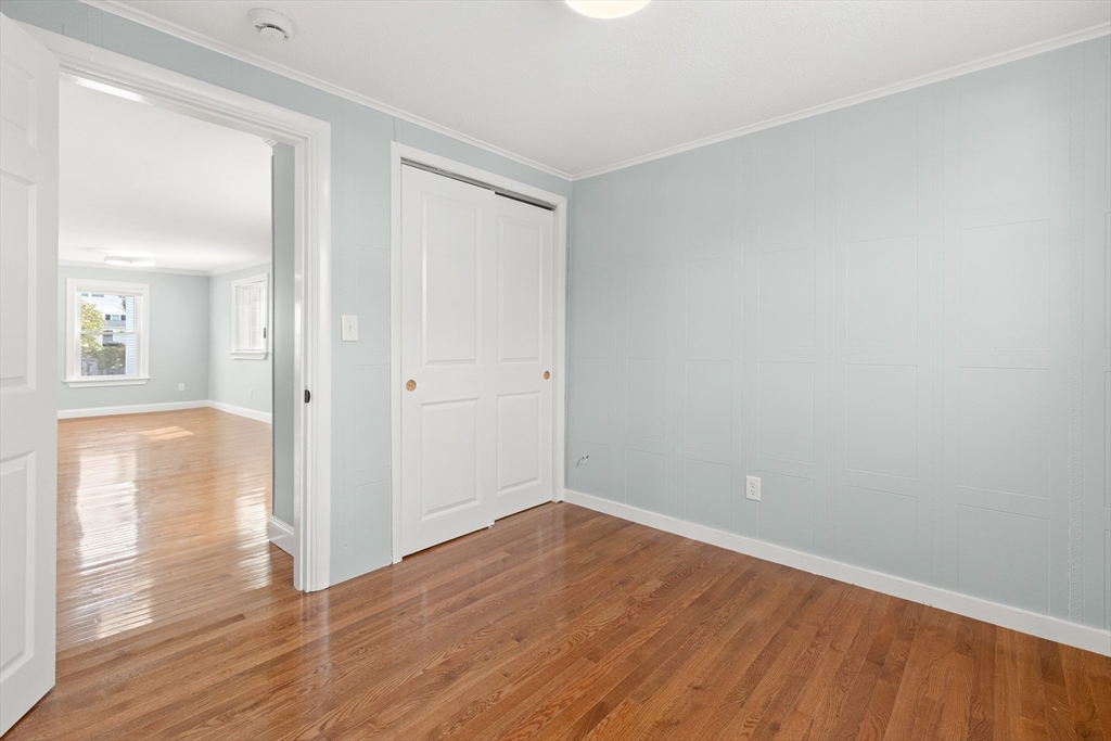 141 Prospect Street Gloucester, MA 01930 - Photo 12 of 32 wooden floor in an empty room