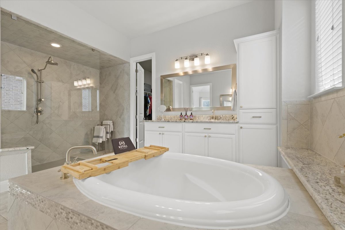 837 Bliss Lane Leander, TX 78641 - Photo 23 of 37 The peaceful ambiance makes this suite ideal for unwinding at the end of the day.