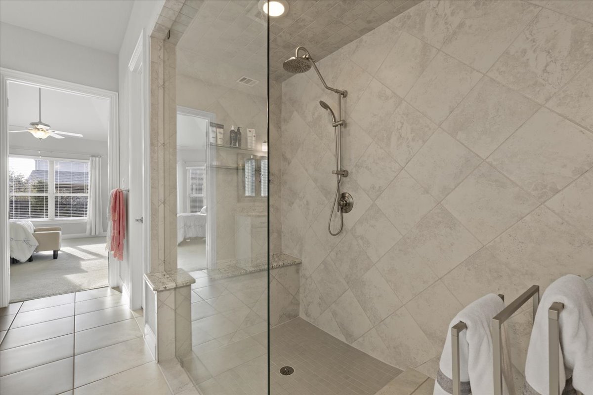 837 Bliss Lane Leander, TX 78641 - Photo 24 of 37 An oversized walk-in shower showcases elegant finishes.