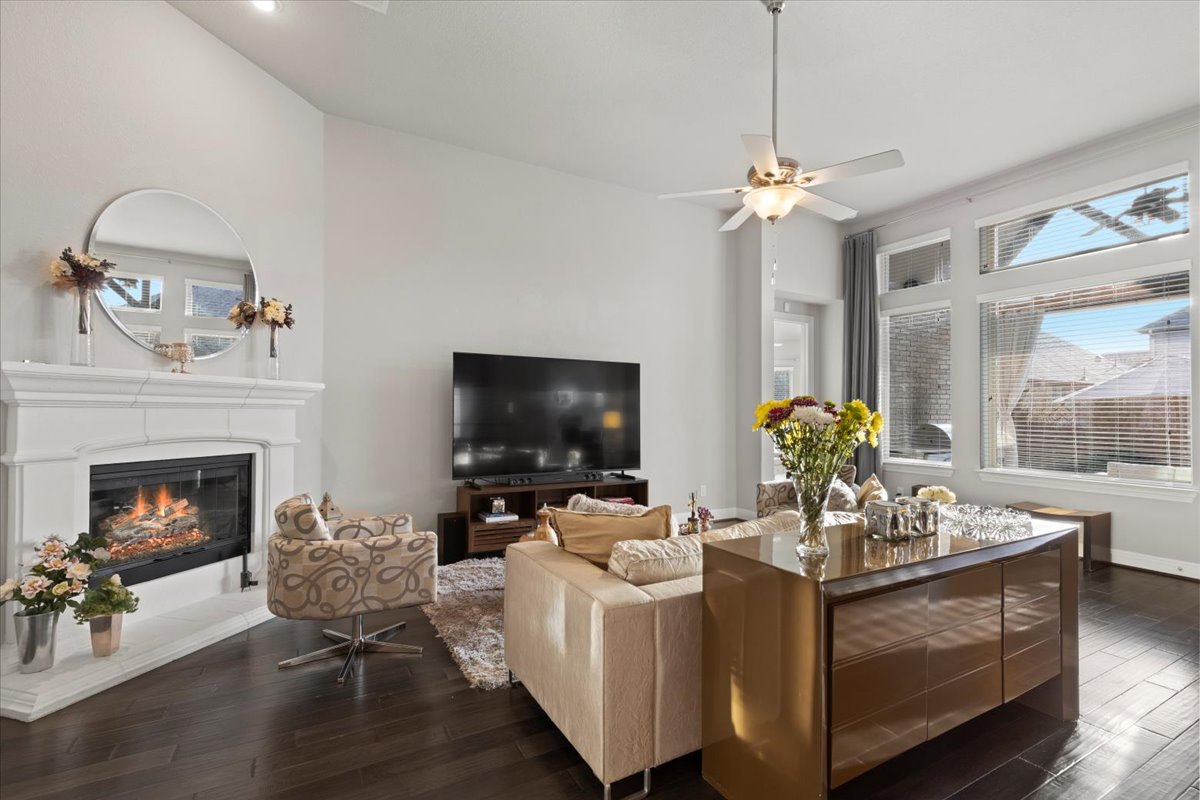 837 Bliss Lane Leander, TX 78641 - Photo 3 of 37 The bright and open living room is filled with abundant natural light.