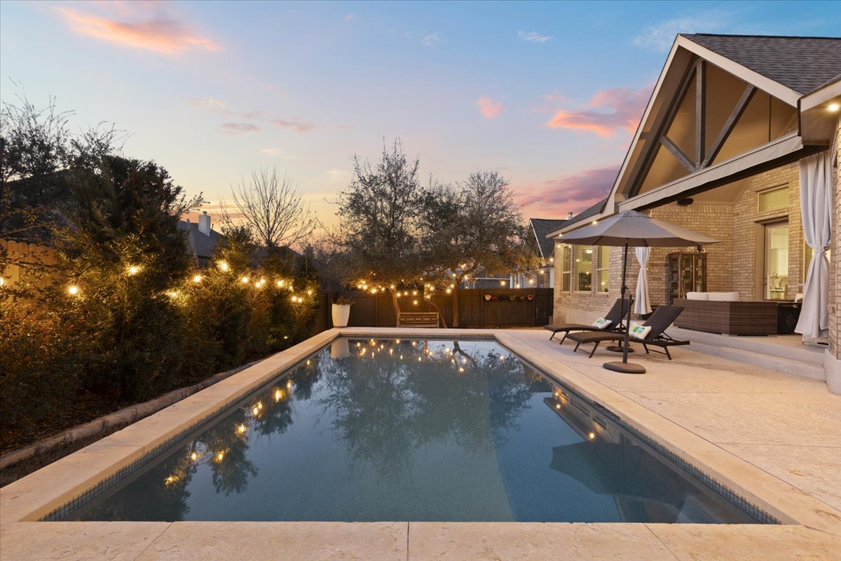 837 Bliss Lane Leander, TX 78641 - Photo 32 of 37 The resort-style backyard features a private heated in-ground pool.