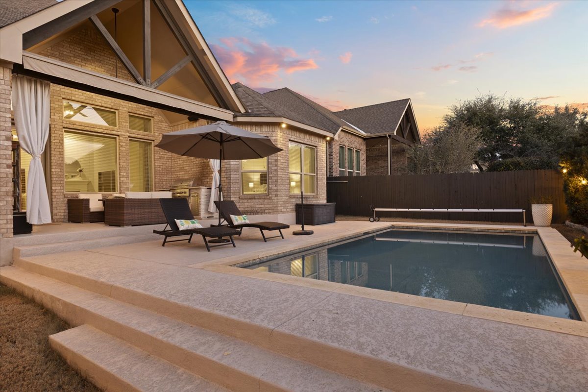 837 Bliss Lane Leander, TX 78641 - Photo 34 of 37 This outdoor oasis is thoughtfully designed for both relaxation and fun.