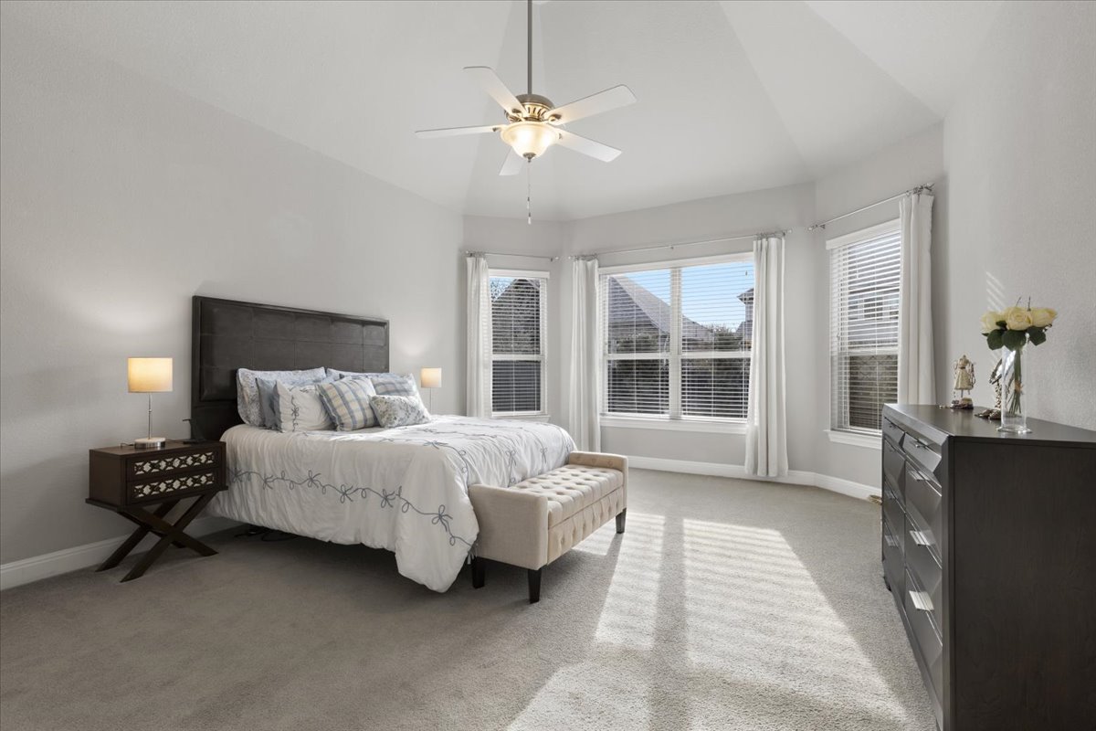 837 Bliss Lane Leander, TX 78641 - Photo 6 of 37 The private owner’s suite offers a spacious and serene retreat.