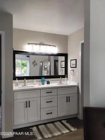 a room with a table and a potted plant