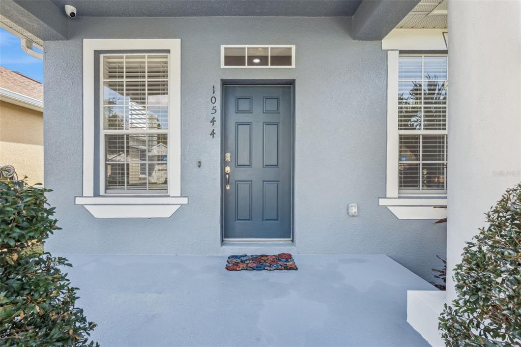 10544 Moss Rose Way Orlando, FL 32832 - Photo 2 of 40 front view of a house