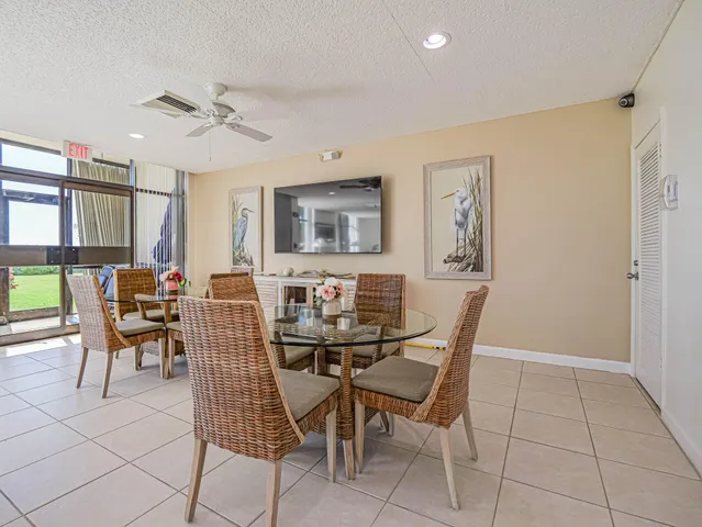 a view of a livingroom with furniture and window