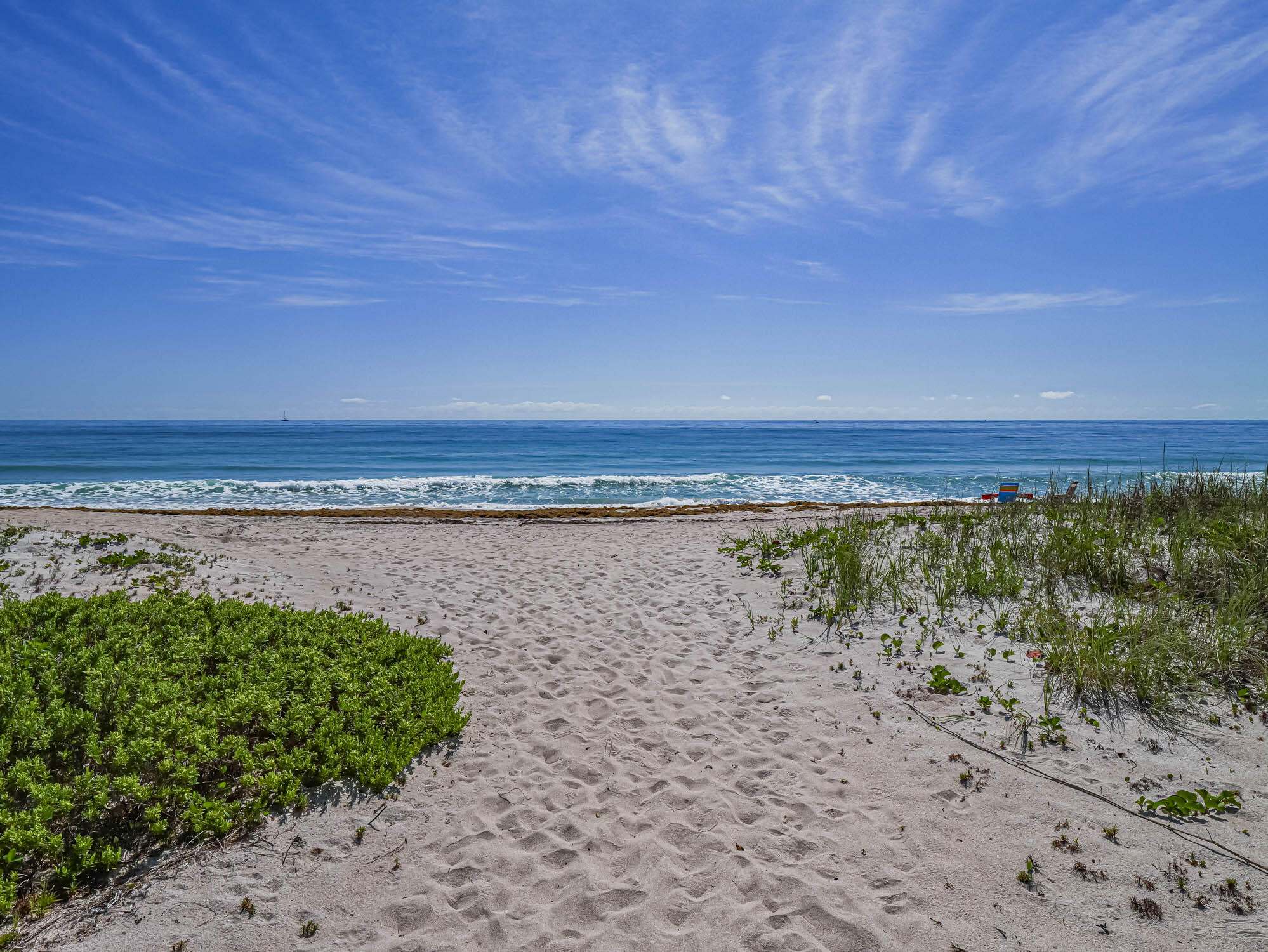 3200 North Hwy A1A, Unit 307 Hutchinson Island, FL 34949 - Photo 20 of 47 a view of a lake with mountain in the background