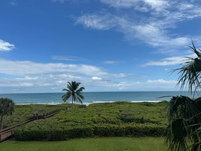 a bathroom with a toilet sink and shower