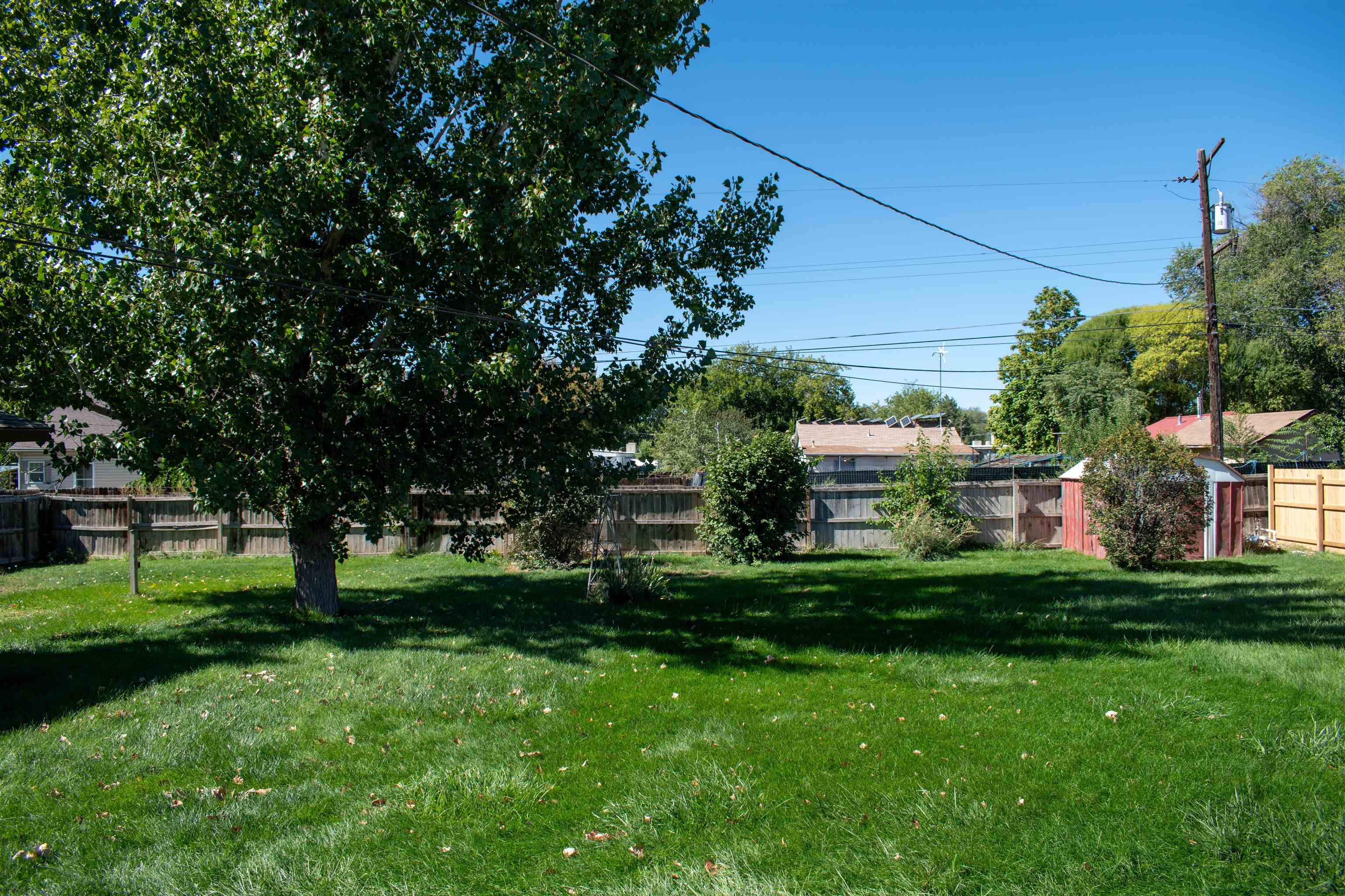 519-29 29 1/4 Road Grand Junction, CO 81504 - Photo 17 of 20 a front view of a house with a yard table and chairs