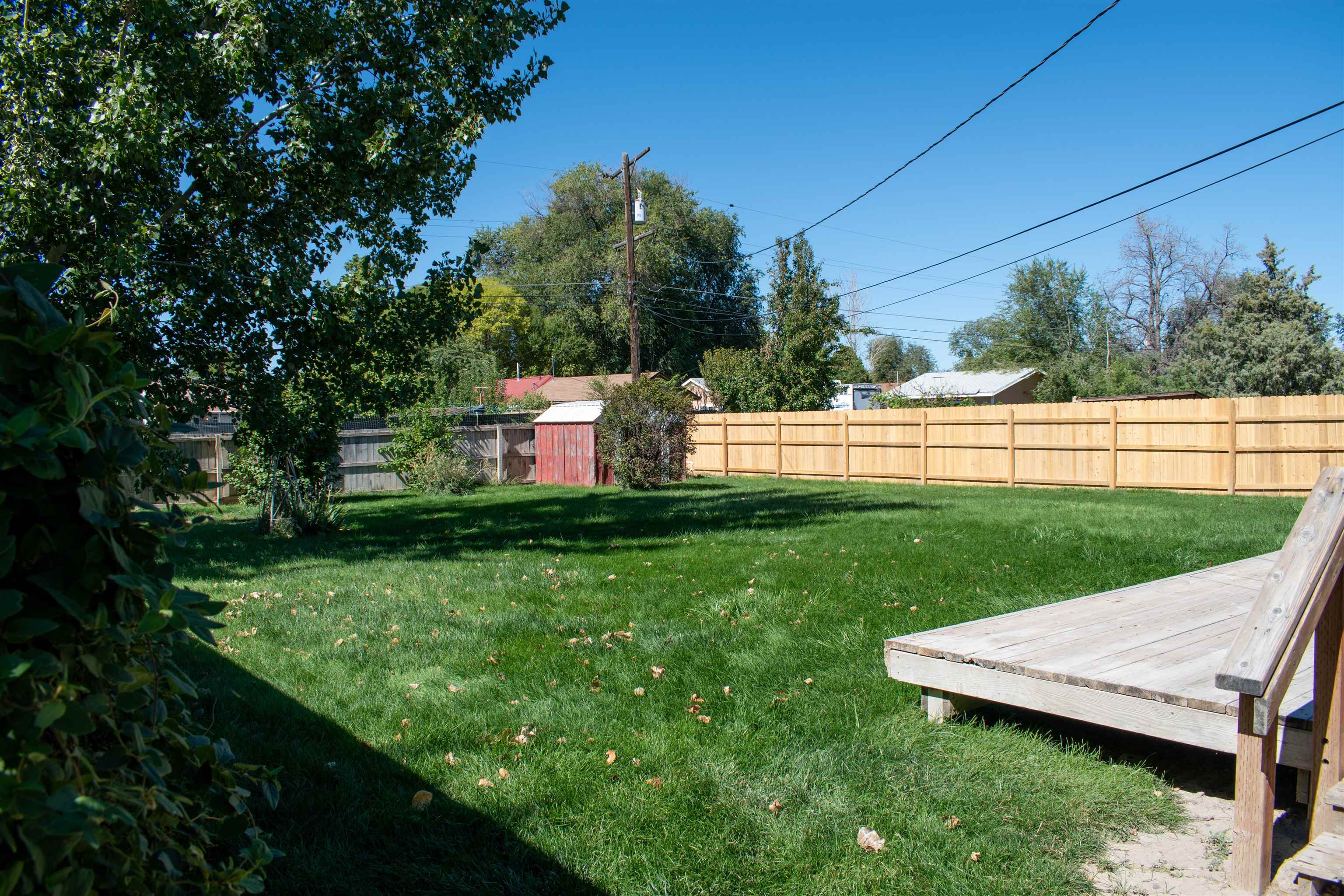 519-29 29 1/4 Road Grand Junction, CO 81504 - Photo 19 of 20 a view of a backyard with wooden fence