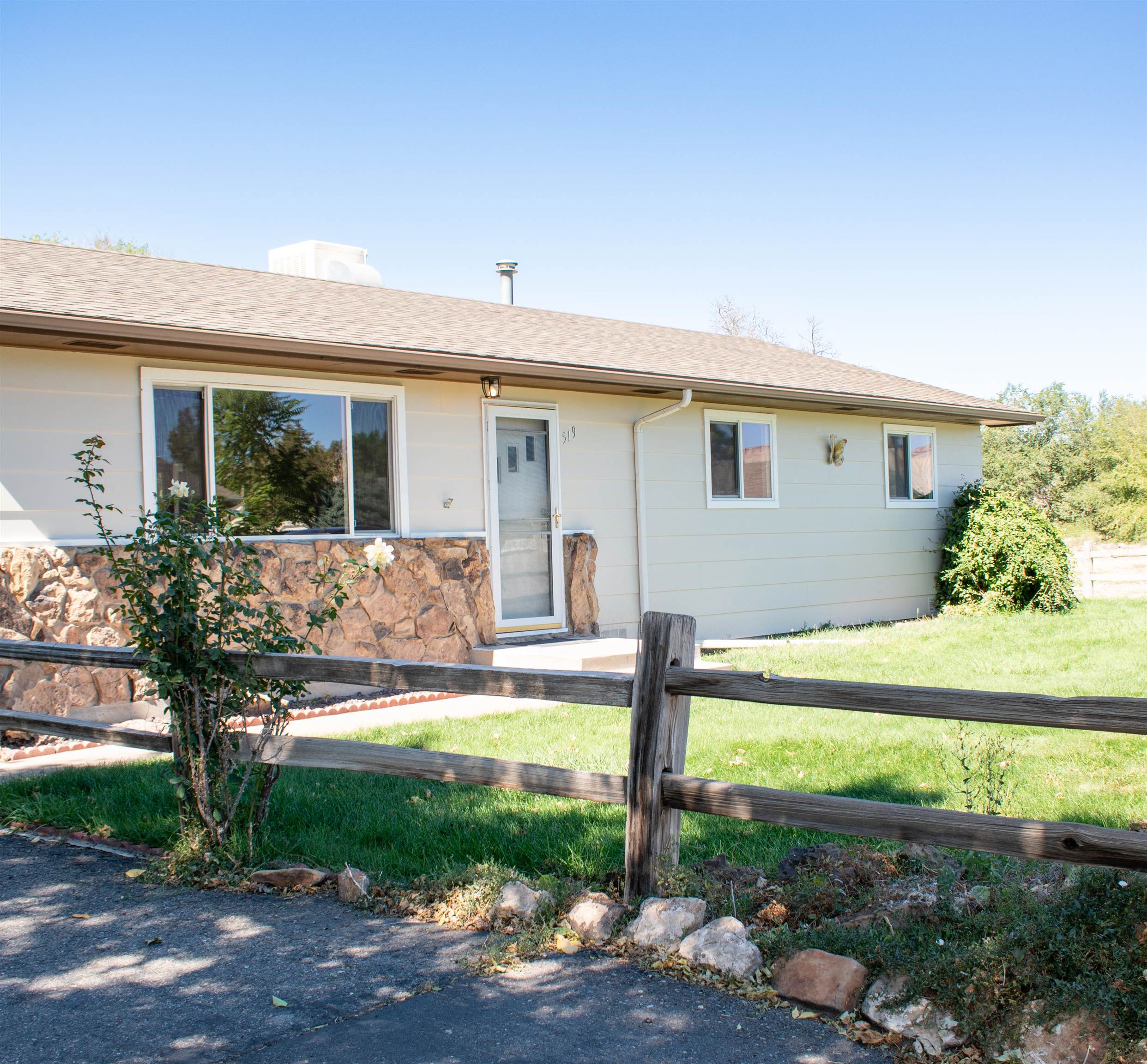 519-29 29 1/4 Road Grand Junction, CO 81504 - Photo 2 of 20 a front view of house with yard and green space