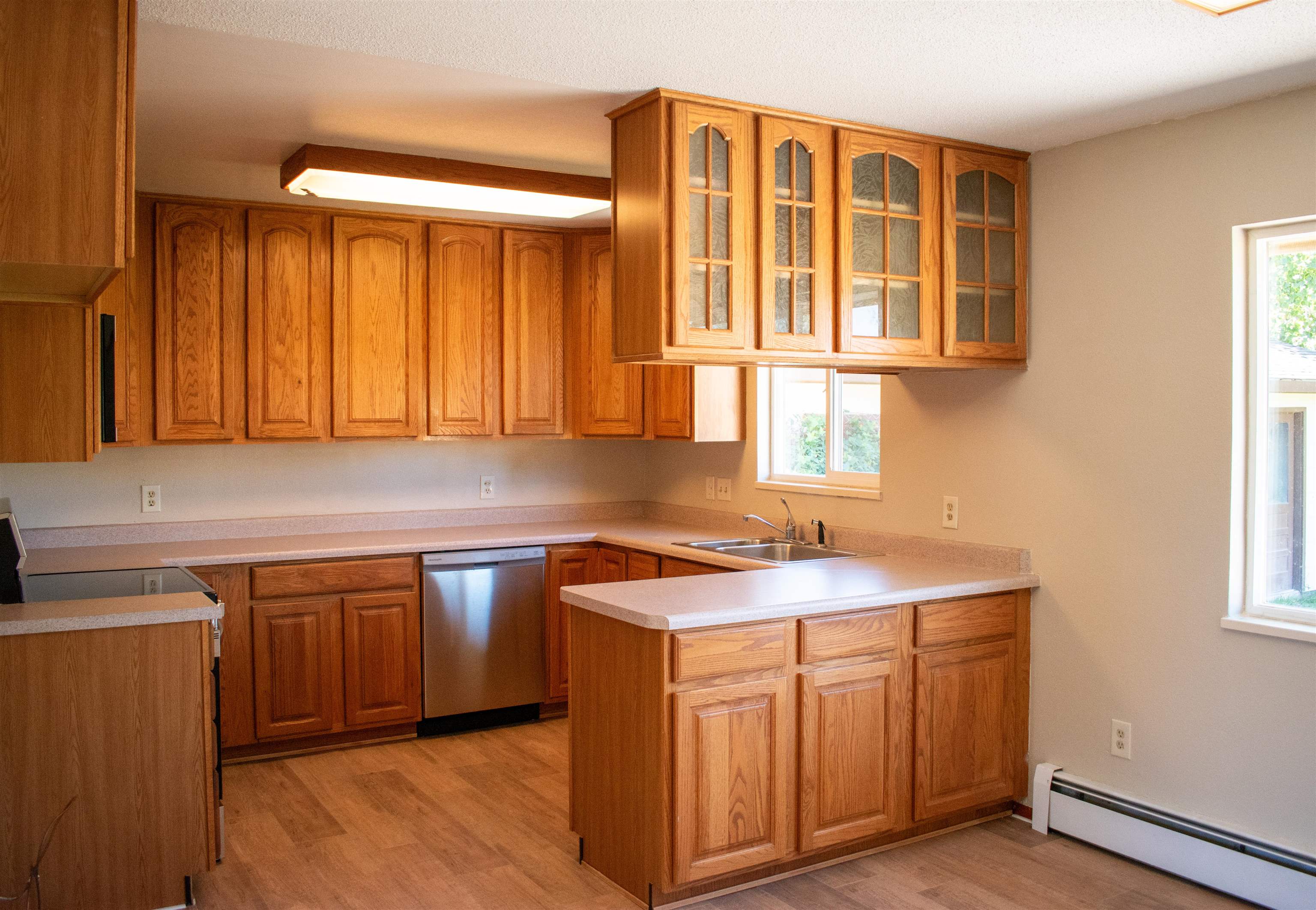 519-29 29 1/4 Road Grand Junction, CO 81504 - Photo 4 of 20 a kitchen with stainless steel appliances granite countertop a sink stove and cabinets