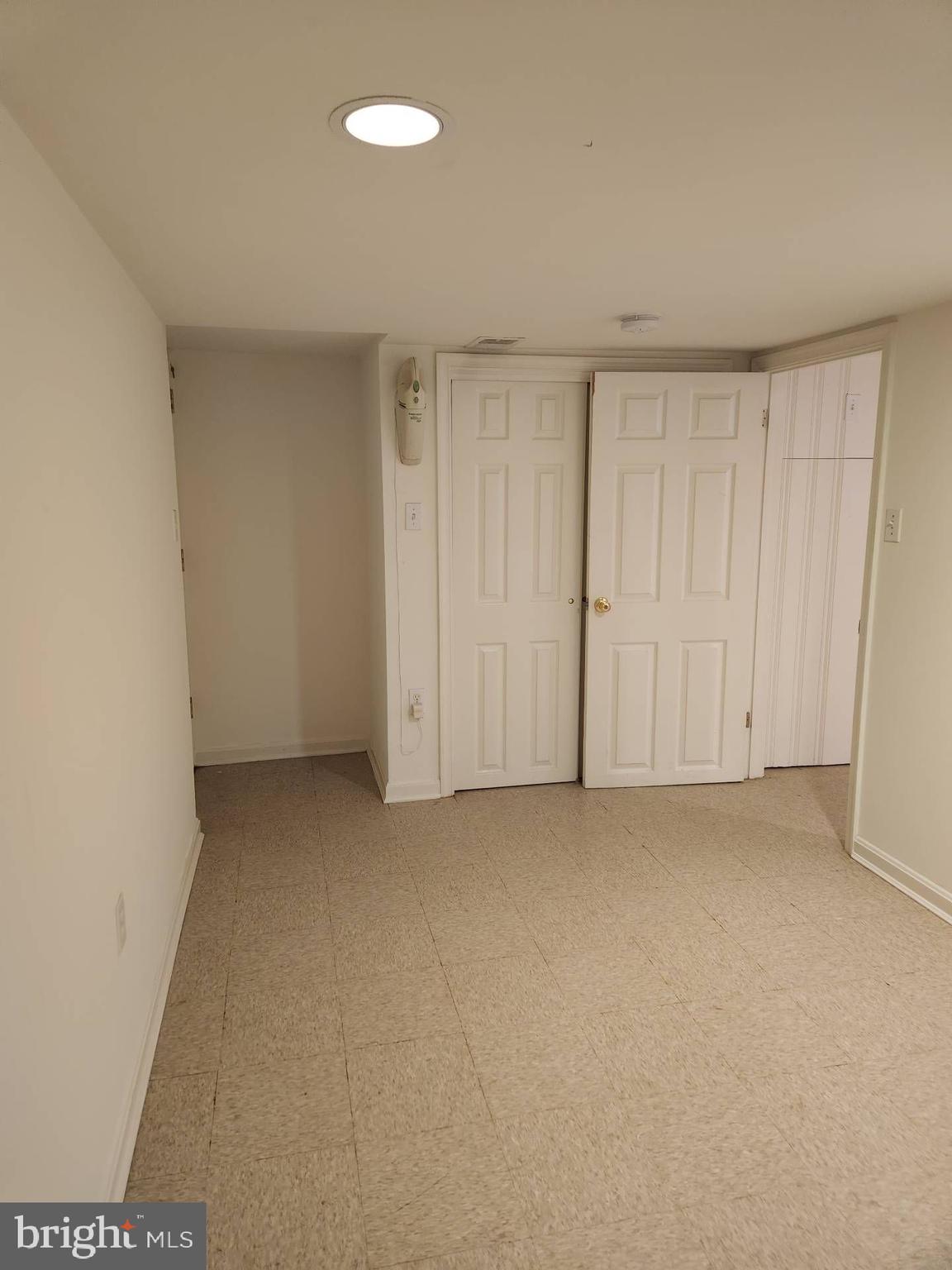 3916 48th Street Northwest Washington, DC 20016 - Photo 23 of 29 a view of an empty room