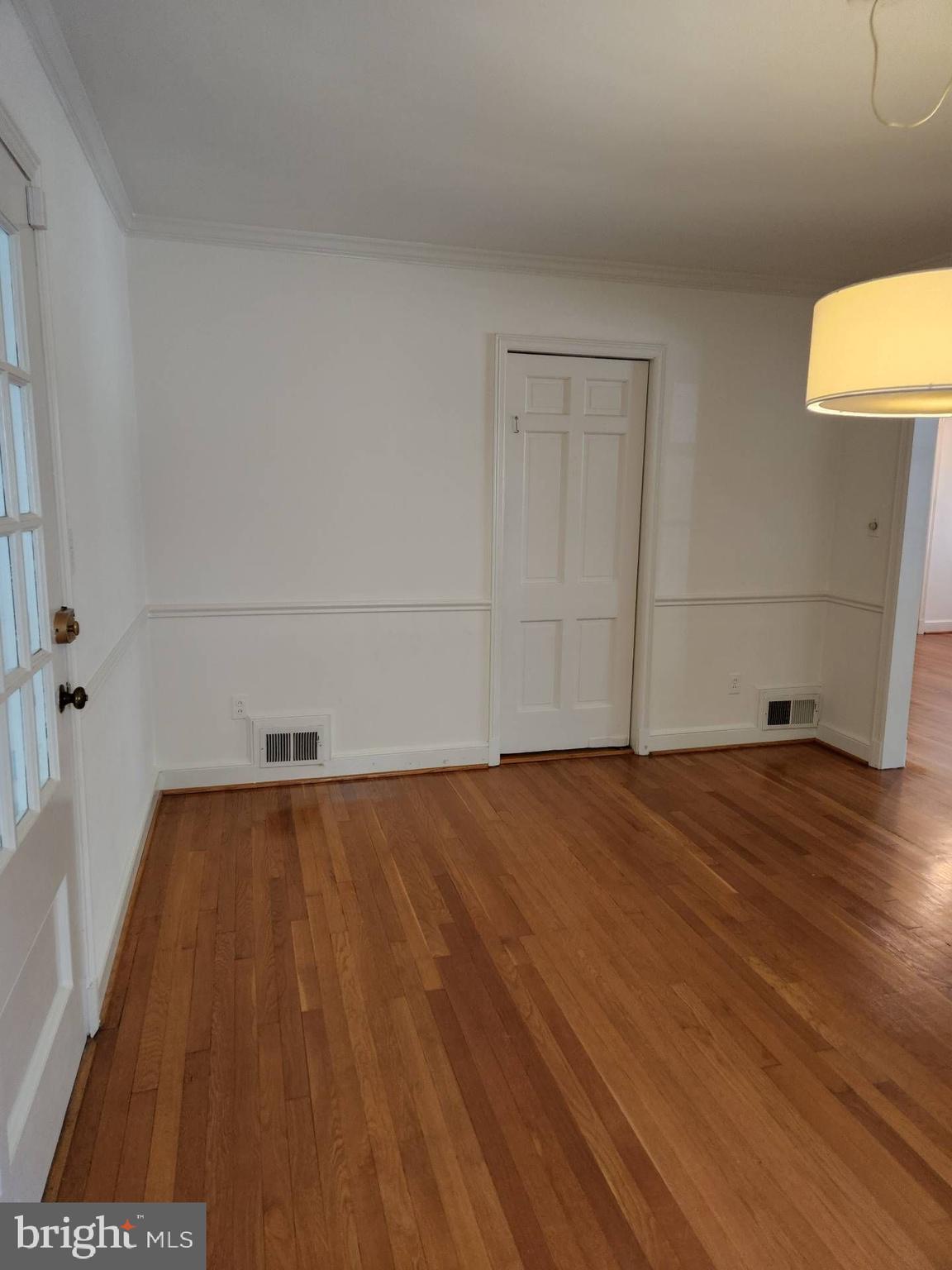 3916 48th Street Northwest Washington, DC 20016 - Photo 9 of 29 a view of a livingroom with wooden floor
