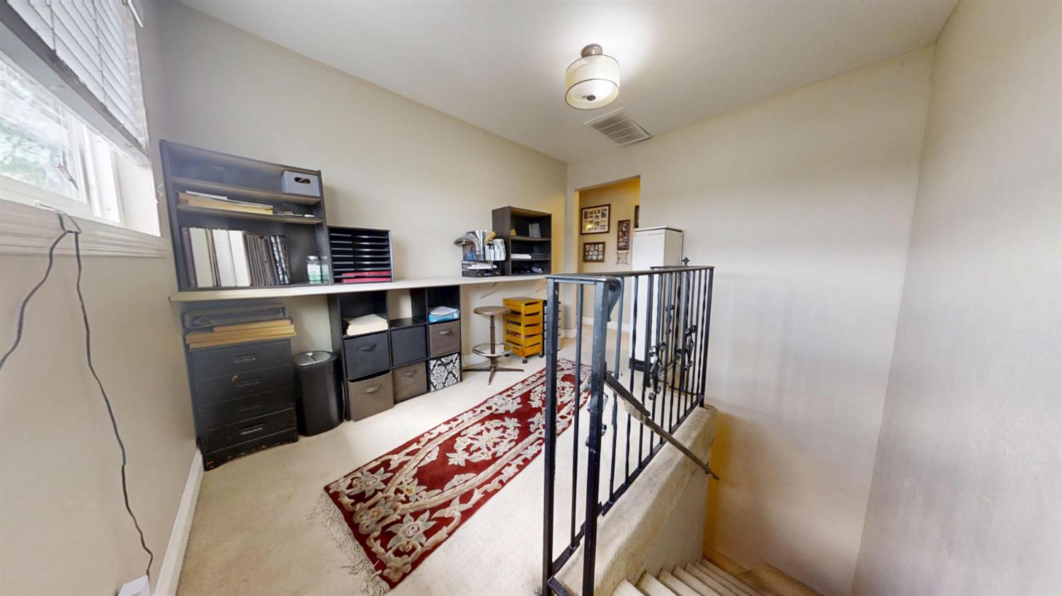 2956 Treen Court Rancho Cordova, CA 95670 - Photo 22 of 67 a bed room with furniture and a book shelf