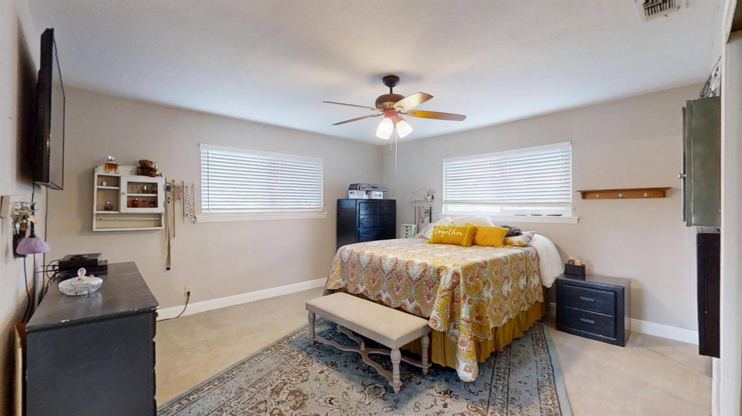 2956 Treen Court Rancho Cordova, CA 95670 - Photo 37 of 67 a bedroom with bed and window