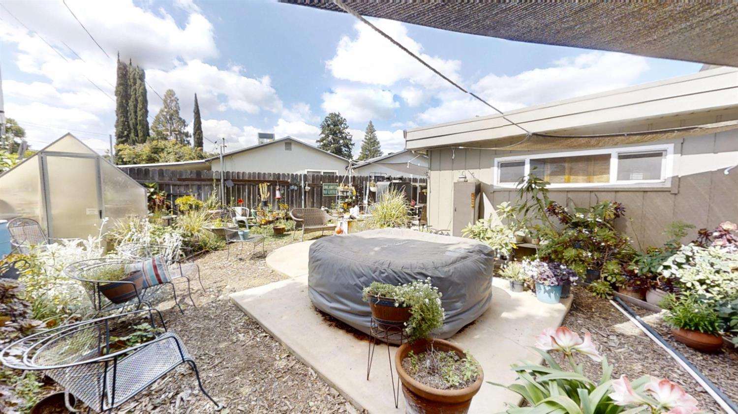 2956 Treen Court Rancho Cordova, CA 95670 - Photo 38 of 67 a view of a backyard with sitting area and garden