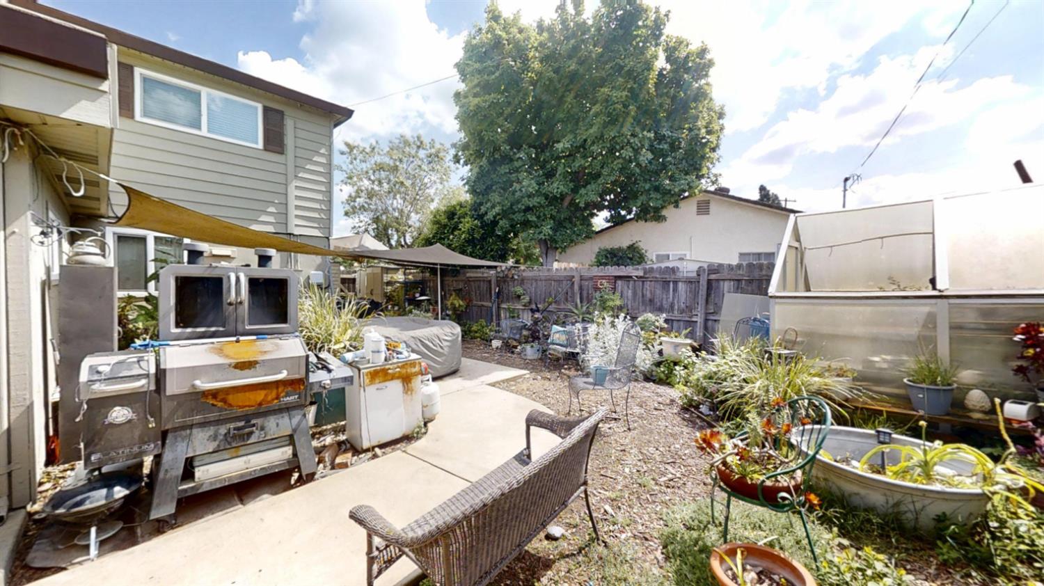 2956 Treen Court Rancho Cordova, CA 95670 - Photo 43 of 67 a view of a chairs and table in backyard of the house