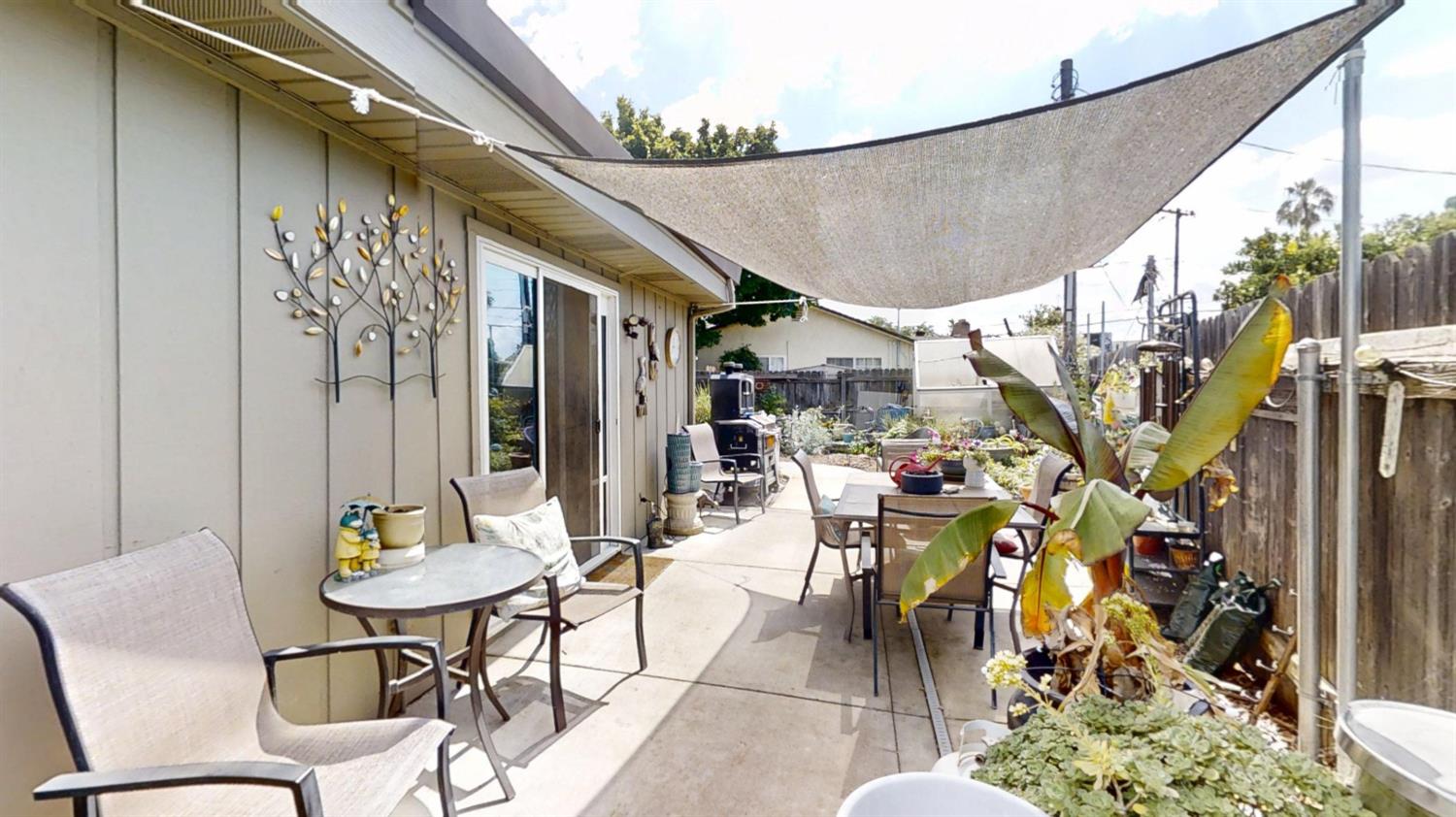 2956 Treen Court Rancho Cordova, CA 95670 - Photo 51 of 67 a view of a patio with table and chairs and potted plants