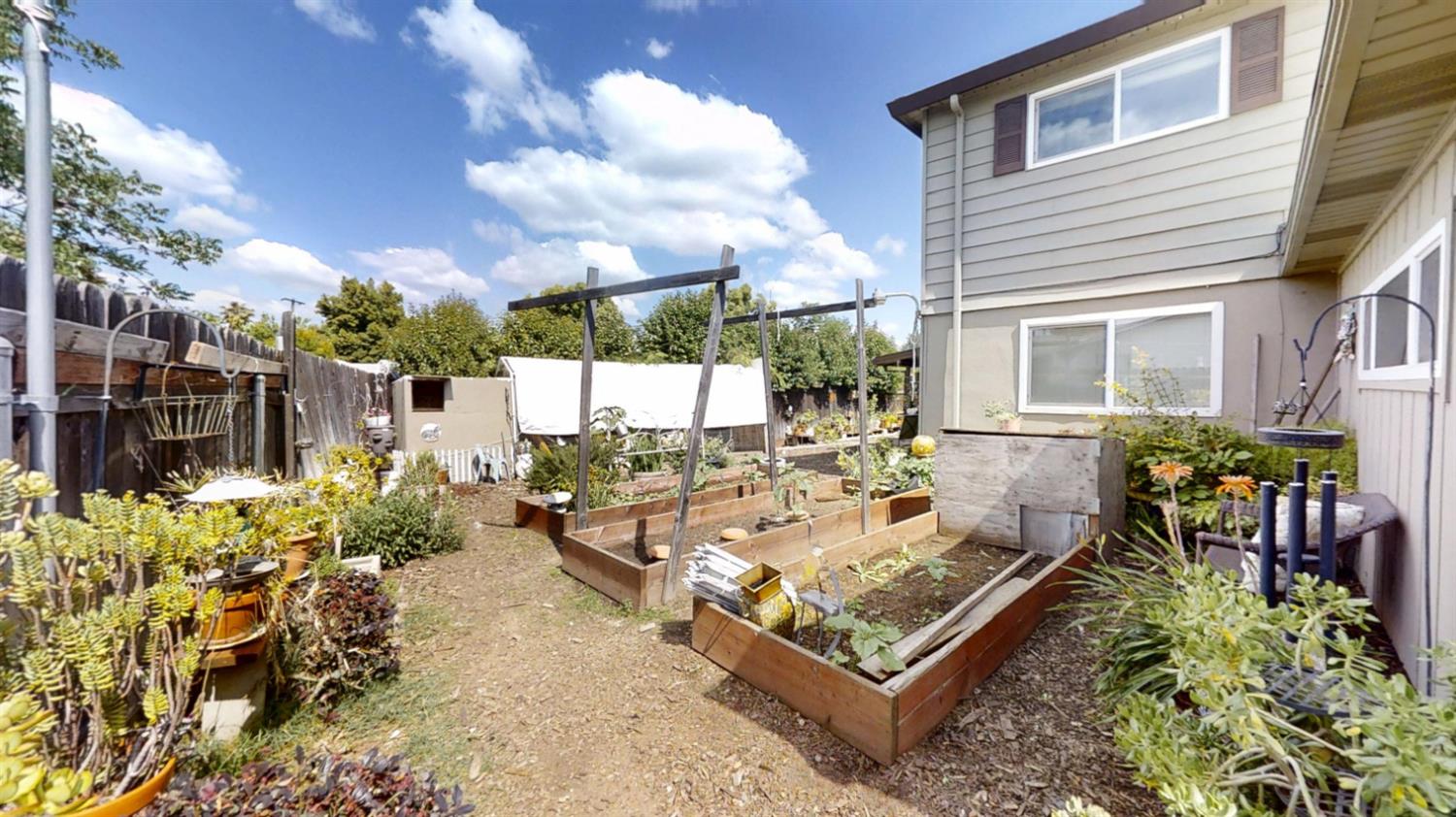 2956 Treen Court Rancho Cordova, CA 95670 - Photo 52 of 67 a view of a patio with table and chairs and potted plants