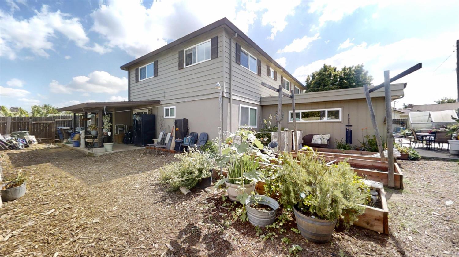 2956 Treen Court Rancho Cordova, CA 95670 - Photo 54 of 67 a front view of a house with a yard and seating space