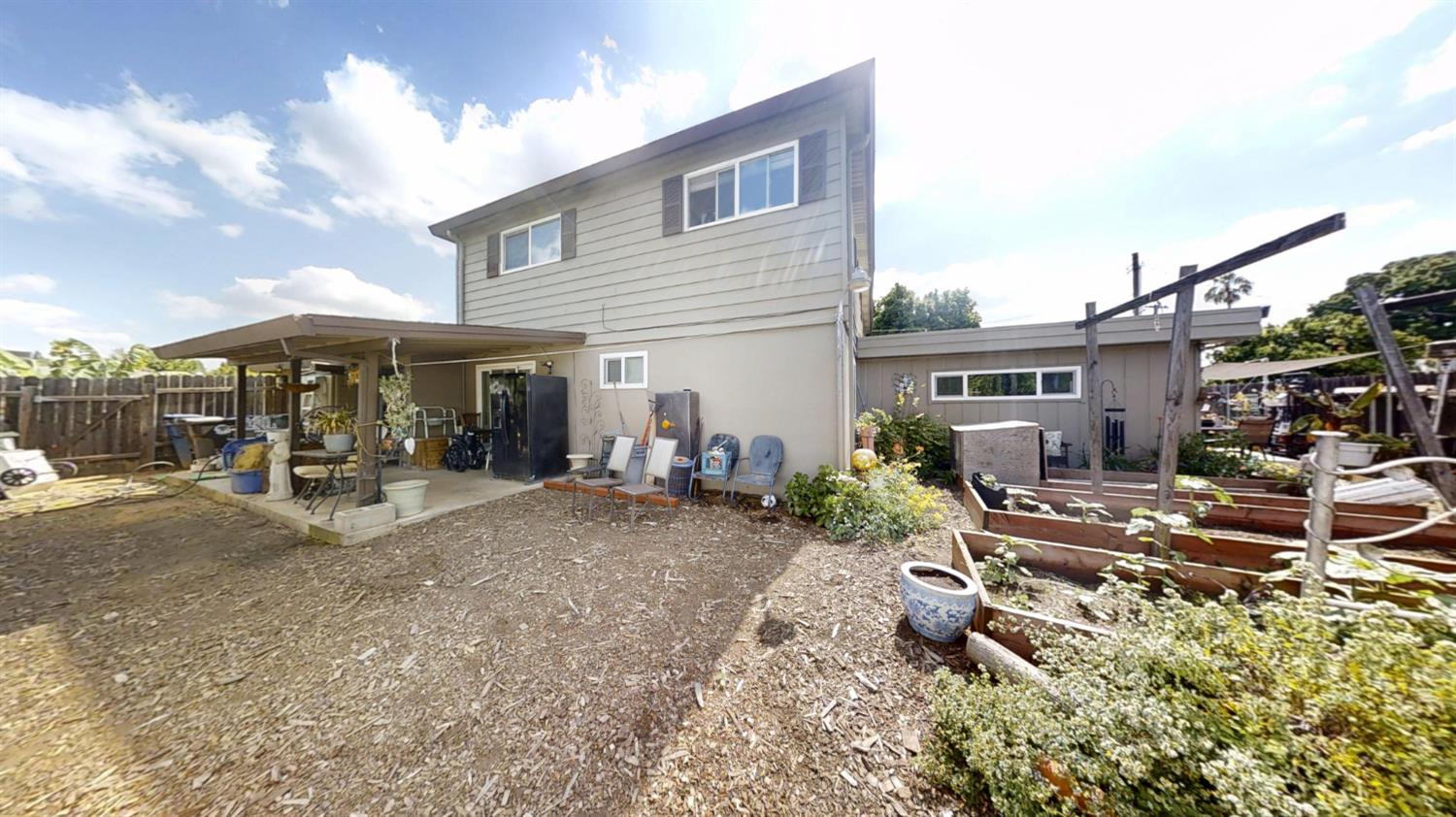 2956 Treen Court Rancho Cordova, CA 95670 - Photo 56 of 67 a view of a house with backyard sitting area and garden