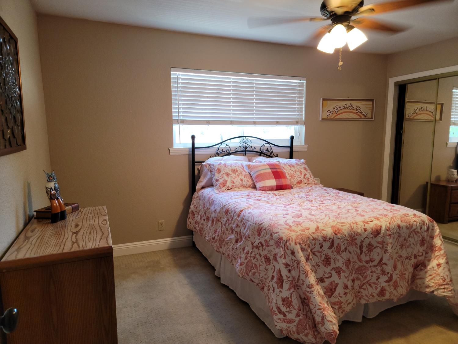 2956 Treen Court Rancho Cordova, CA 95670 - Photo 65 of 67 a bedroom with a bed and a chandelier