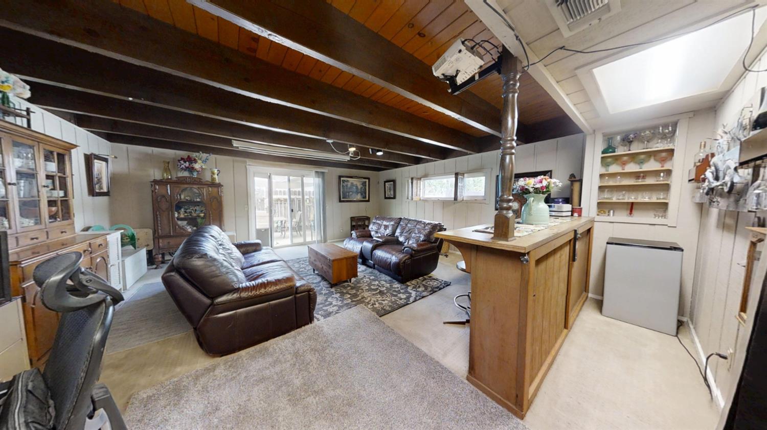 2956 Treen Court Rancho Cordova, CA 95670 - Photo 10 of 67 a living room with lots of furniture and a chandelier