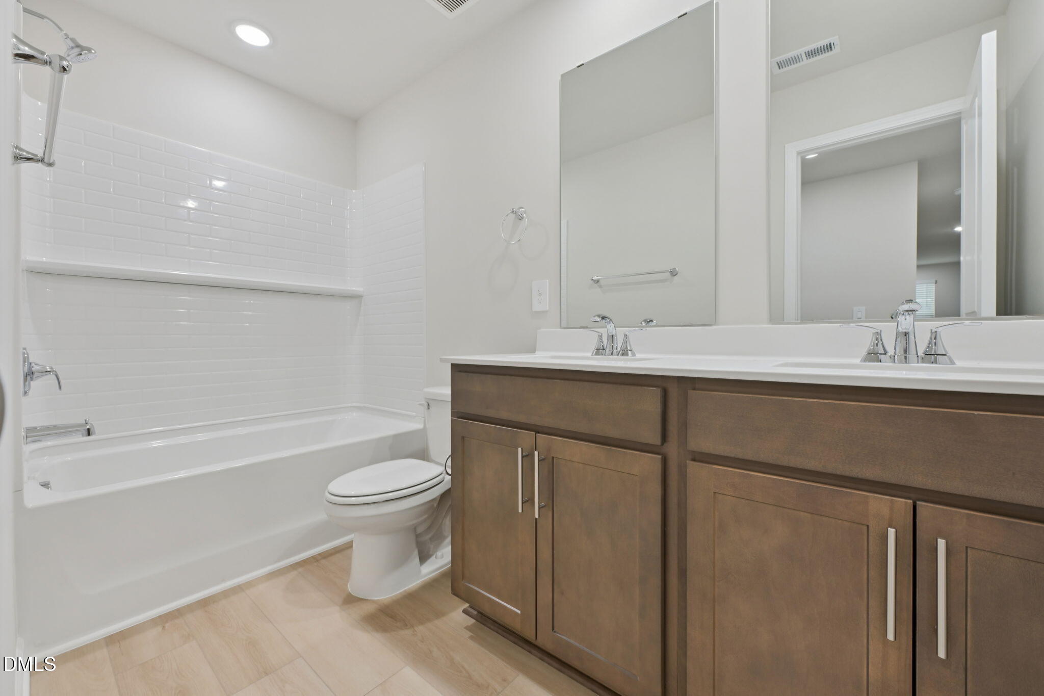 2147 Topsail Road Durham, NC 27703 - Photo 27 of 31 a bathroom with a sink a toilet and a bathtub