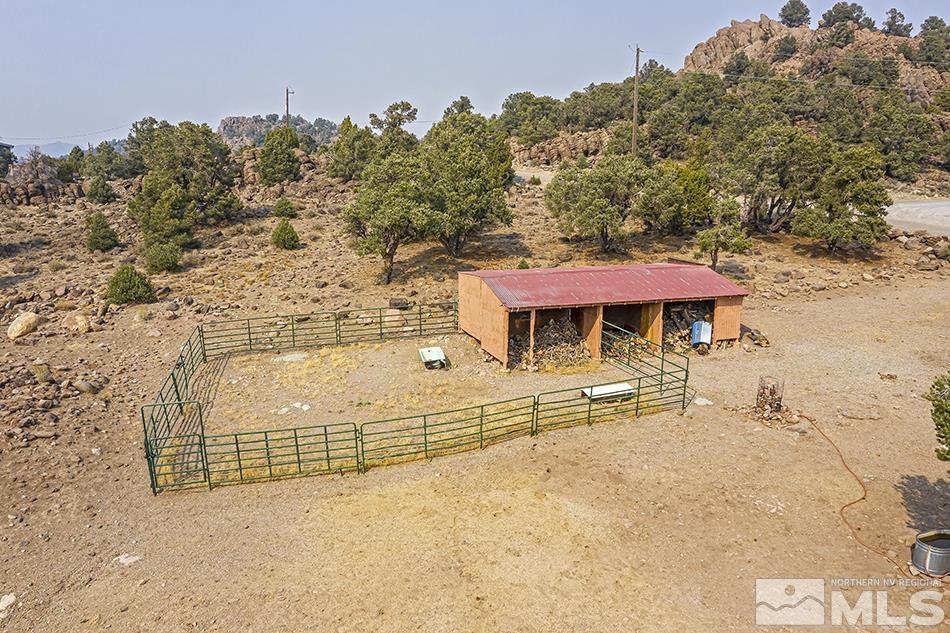 4090 Whiskey Flat Road Reno, NV 89521 - Photo 26 of 29 a view of a terrace with a bench