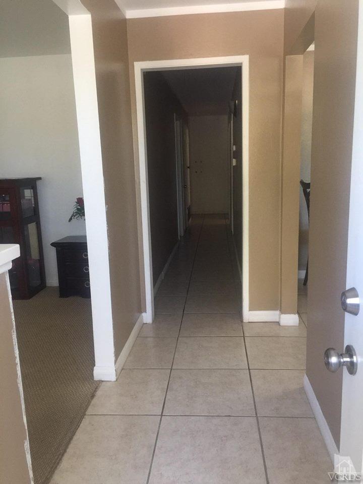 4230 Reeder Avenue Oxnard, CA 93033 - Photo 2 of 12 a view of a hallway to rooms