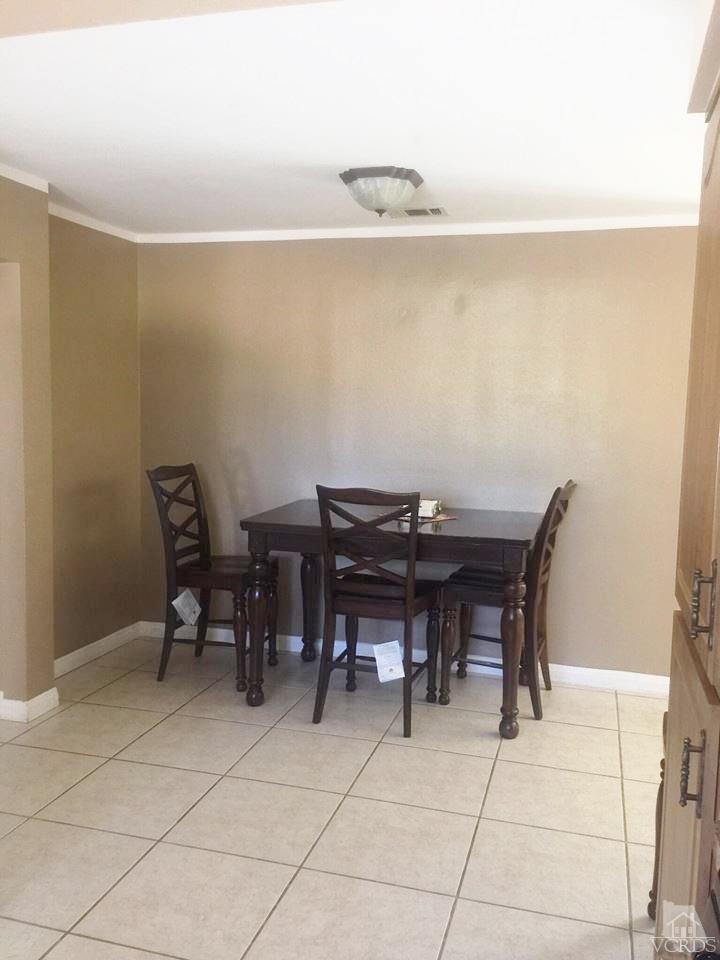 4230 Reeder Avenue Oxnard, CA 93033 - Photo 4 of 12 a view of a dining area with furniture
