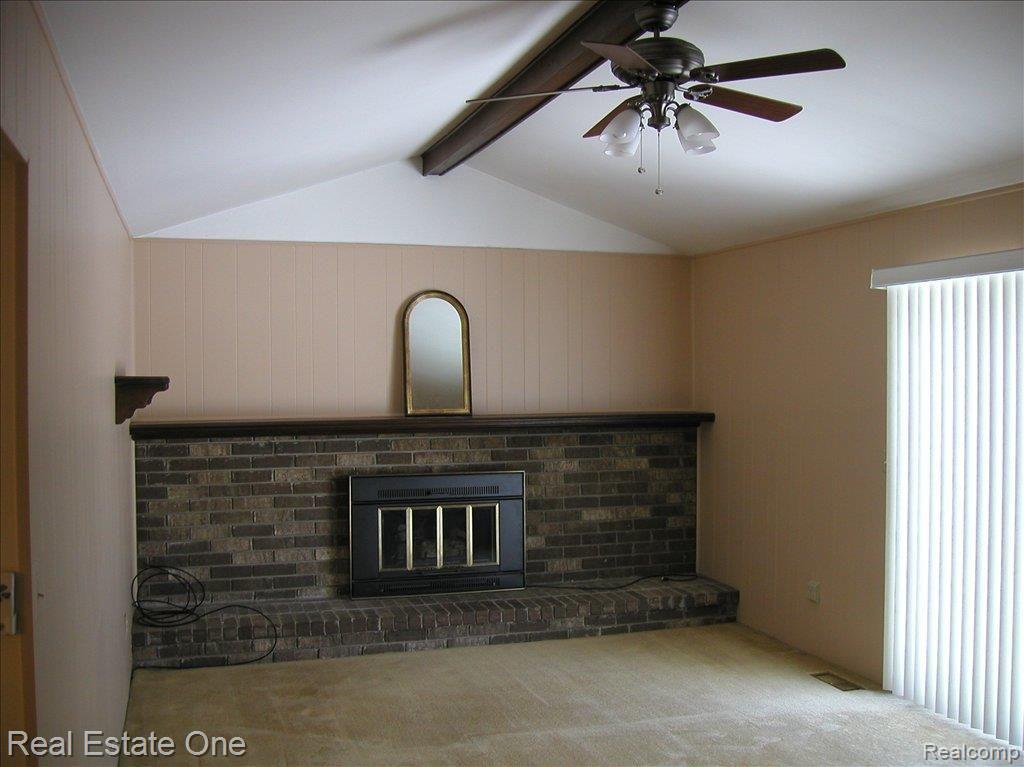 12001 North Canton Center Road Plymouth, MI 48170 - Photo 7 of 19 Family room w/brick Hearth FP