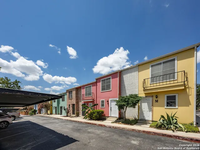 a view of a building with a street